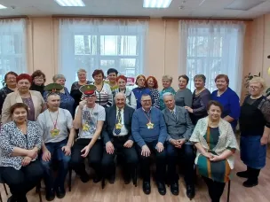 Мужчин городского общества ВОИ поздравили в библиотеке